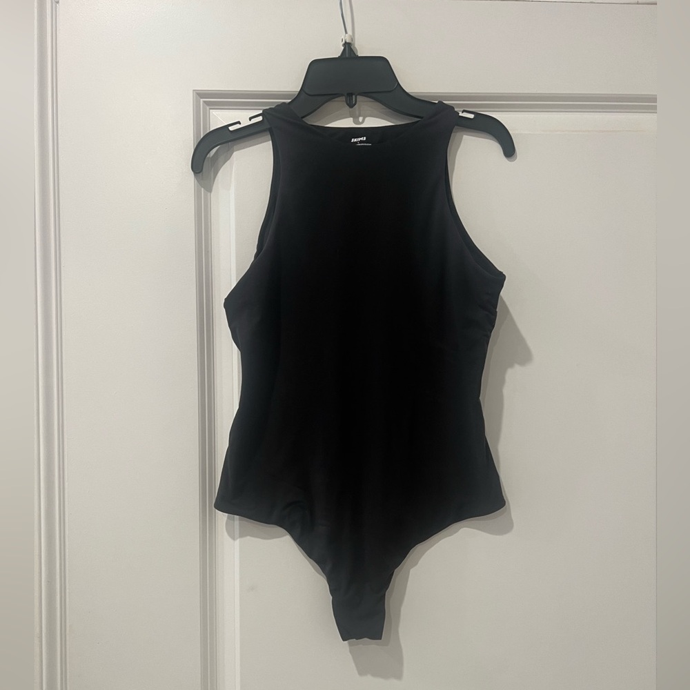 Skims black bodysuit size large